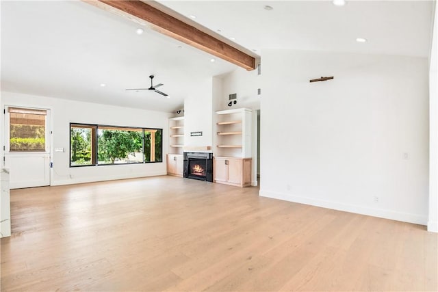 unfurnished living room featuring beam ceiling, high vaulted ceiling, light hardwood / wood-style flooring, and ceiling fan