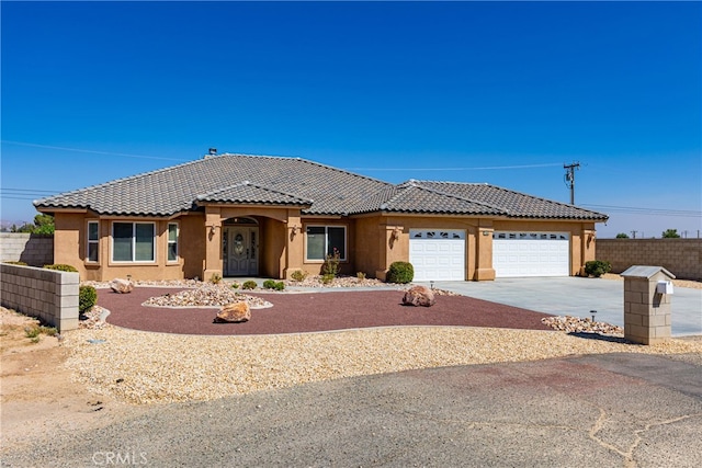 view of front of house with a garage