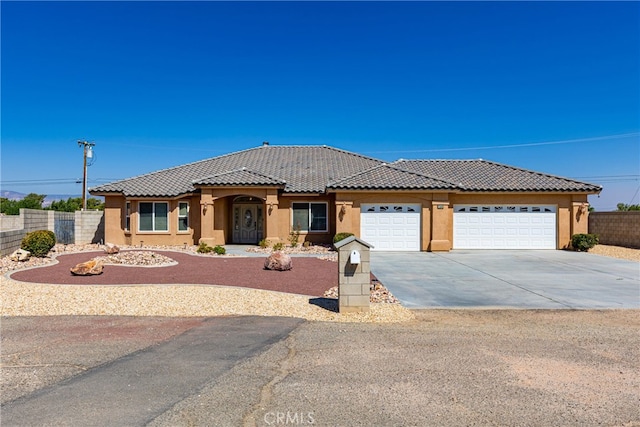 view of front of home featuring a garage