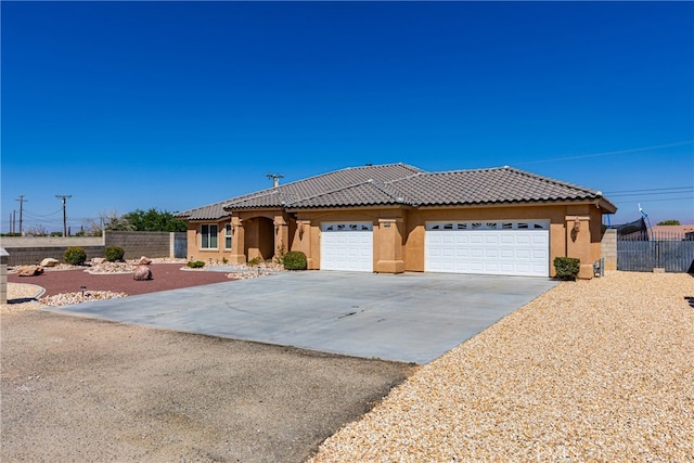 view of front of home featuring a garage