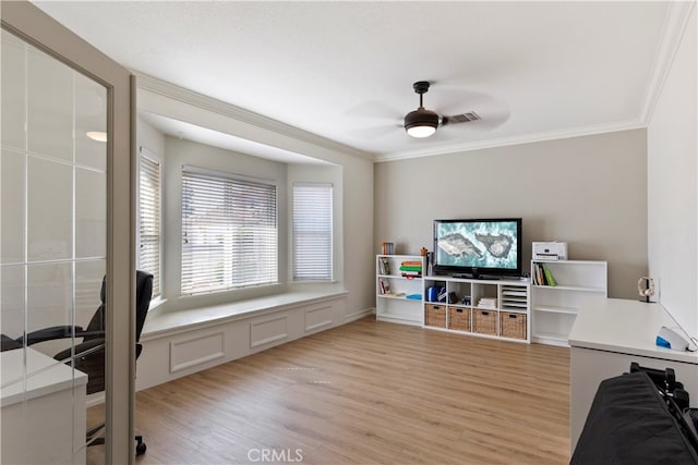 office with ceiling fan, light hardwood / wood-style flooring, and ornamental molding