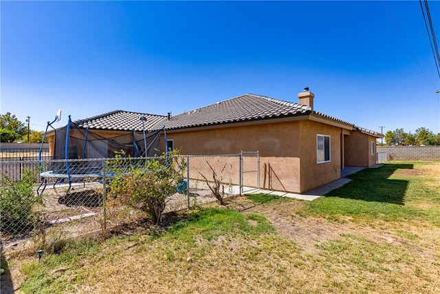 view of home's exterior featuring a yard