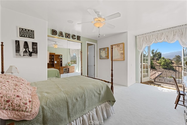 carpeted bedroom with access to exterior and ceiling fan