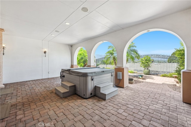 view of patio / terrace featuring a hot tub