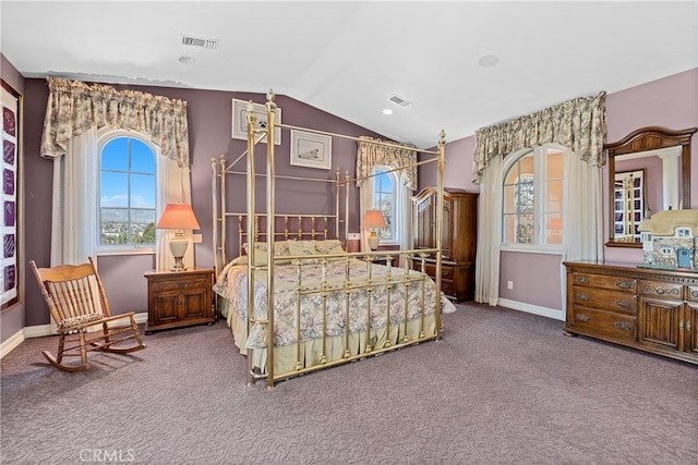 bedroom featuring lofted ceiling and carpet