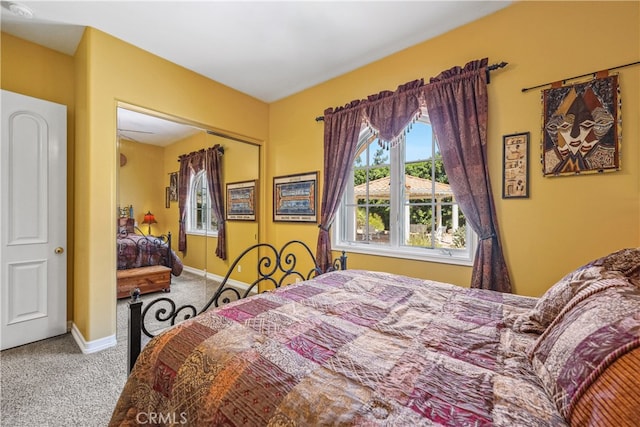 bedroom featuring a closet and carpet flooring