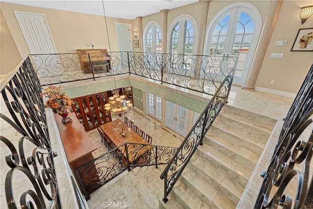 entryway with decorative columns