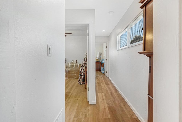 corridor featuring light hardwood / wood-style flooring