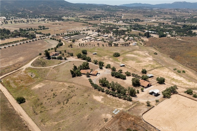 bird's eye view featuring a rural view and a mountain view