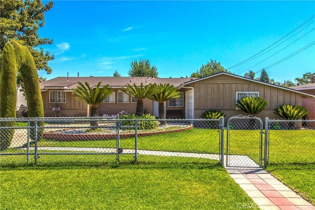 ranch-style house with a front lawn