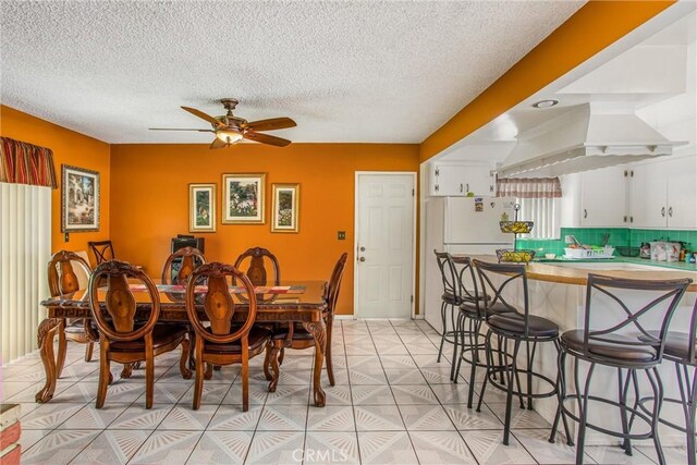 15937 Manzanita Dr, Fontana, CA 92335 - dining area featuring a ceiling fan and a textured ceiling