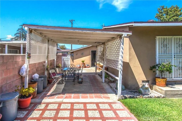15937 Manzanita Dr, Fontana, CA 92335 - view of patio with fence and outdoor dining area