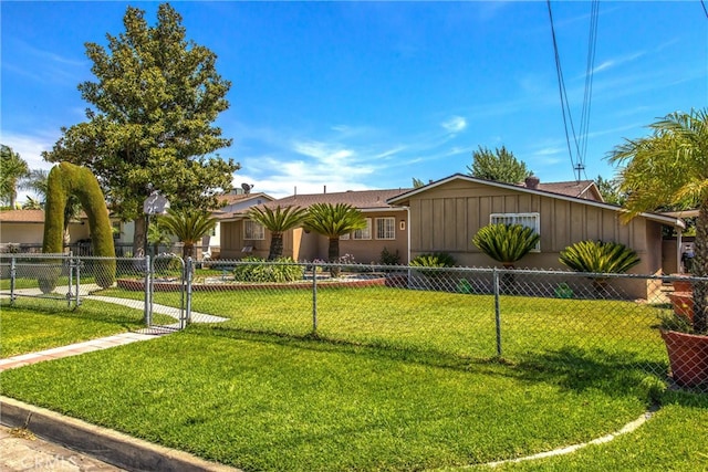 ranch-style house featuring a front lawn