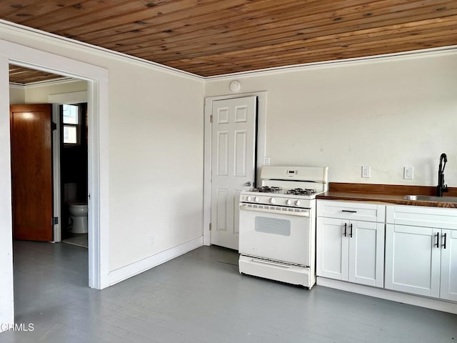 kitchen featuring white gas range, ornamental molding, wood ceiling, sink, and white cabinets