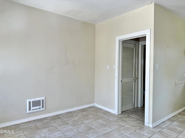 view of tiled spare room