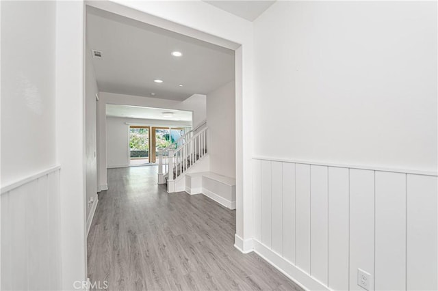 corridor featuring light hardwood / wood-style flooring