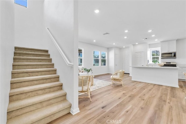 interior space featuring light hardwood / wood-style flooring and sink