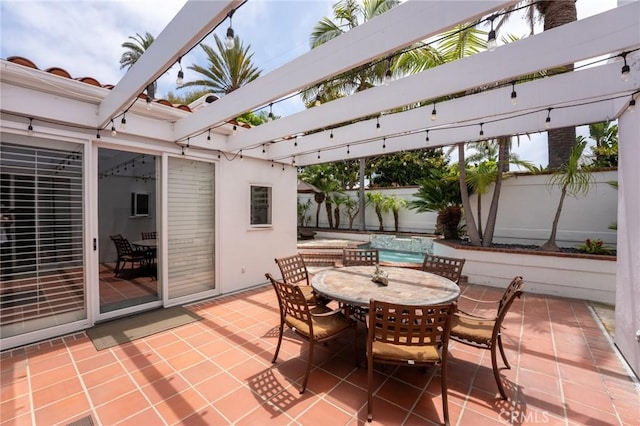 view of patio / terrace with a fenced backyard and outdoor dining space