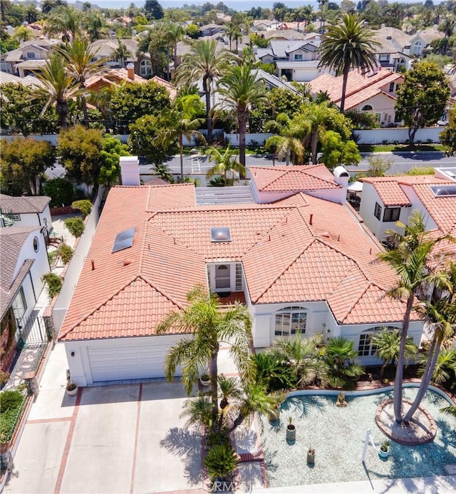 birds eye view of property with a residential view