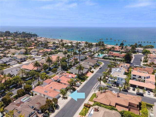 bird's eye view featuring a residential view and a water view