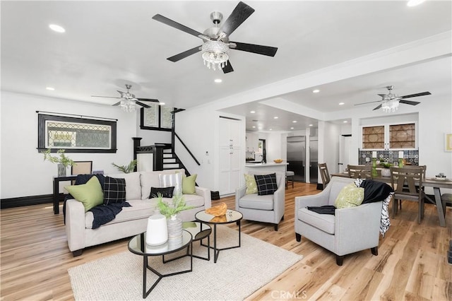 living room with light hardwood / wood-style flooring