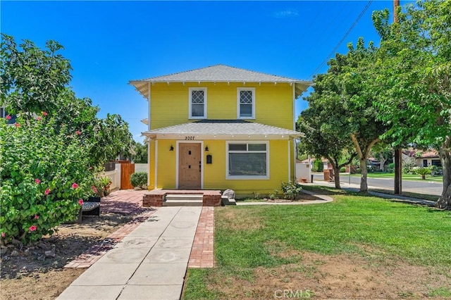 front of property with a front yard