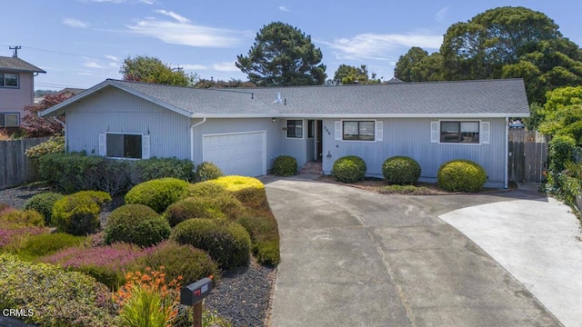 single story home with a garage