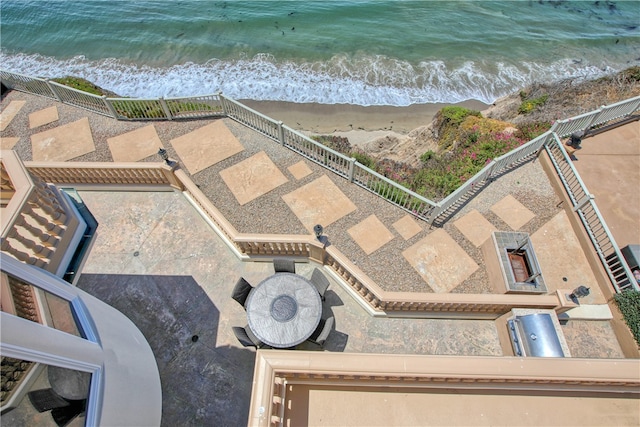 drone / aerial view with a view of the beach and a water view