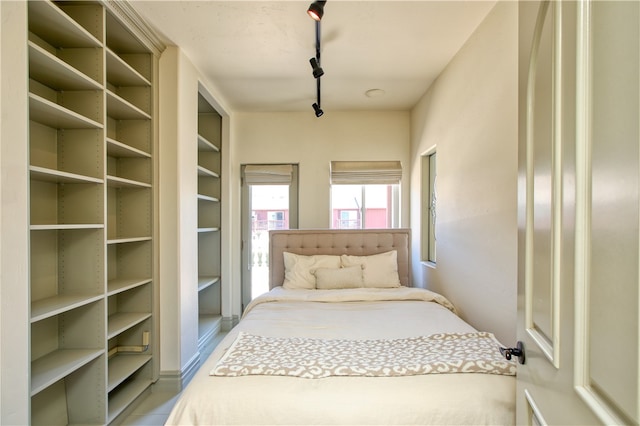 bedroom with track lighting