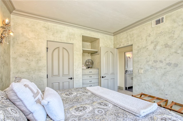 bedroom with sink and ornamental molding