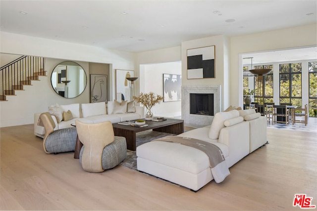 living room with light hardwood / wood-style flooring