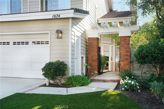 doorway to property featuring a garage