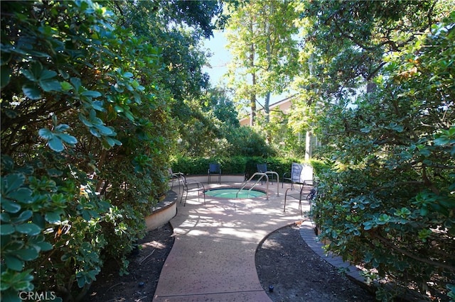 view of patio / terrace featuring a pool