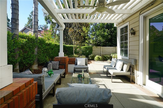 view of patio featuring a pergola, an outdoor living space, and ceiling fan