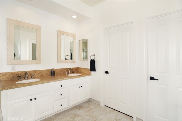 bathroom with vanity and tile patterned floors