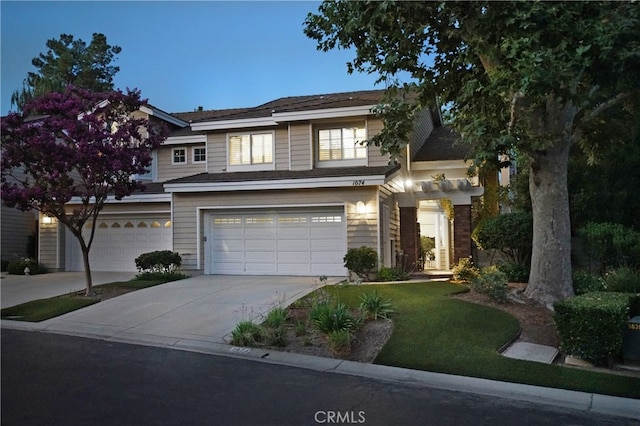 view of front of property featuring a garage