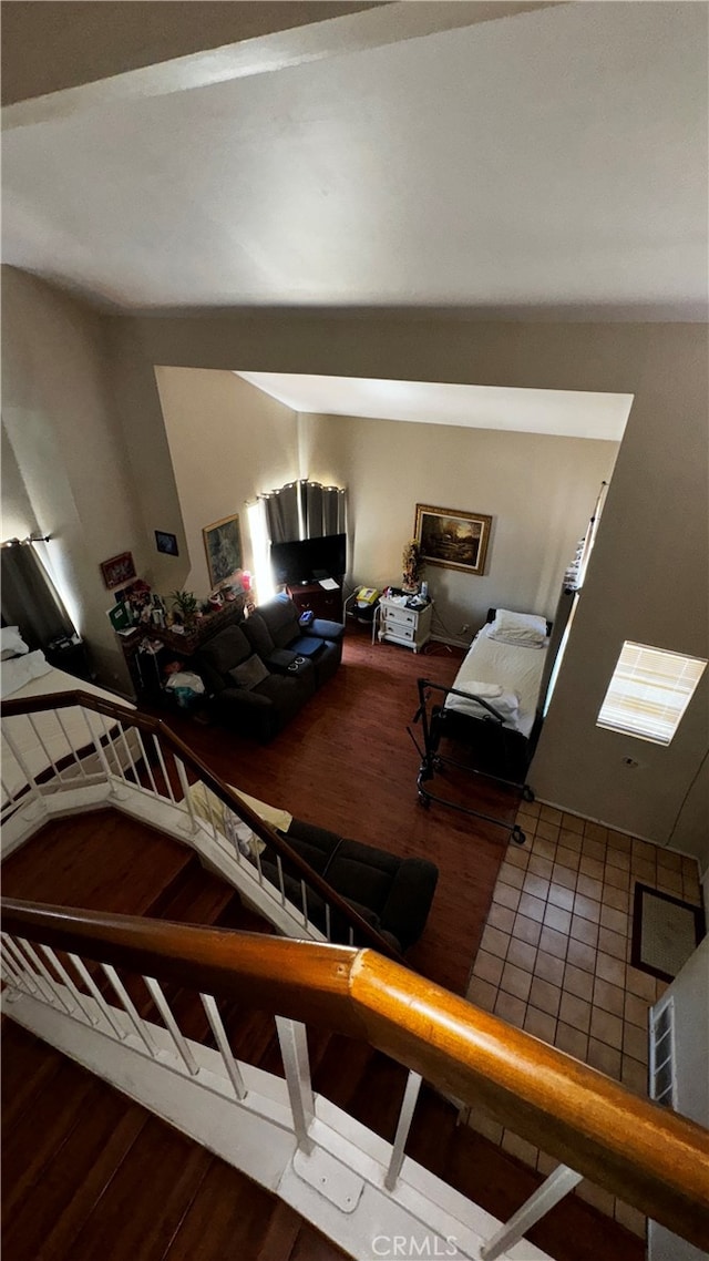 unfurnished living room with wood-type flooring