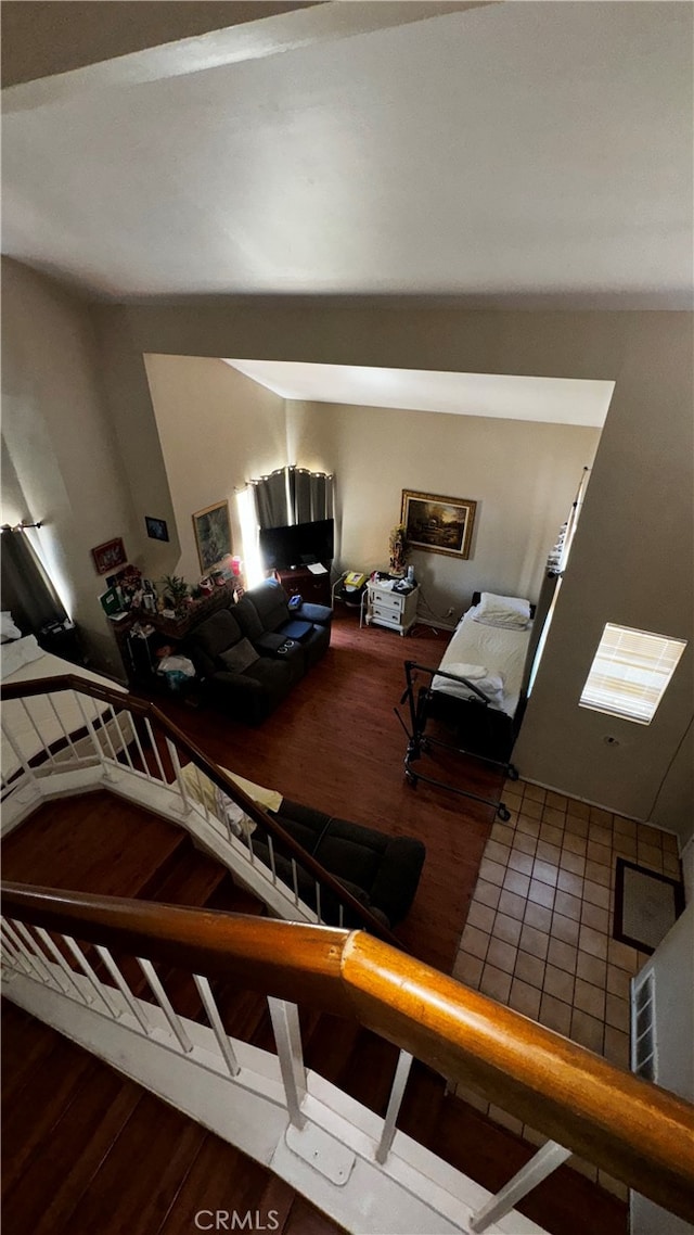 unfurnished living room with wood-type flooring