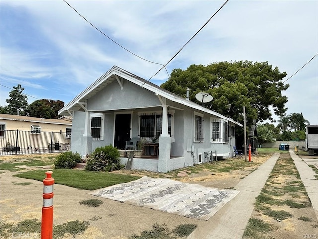 bungalow featuring covered porch