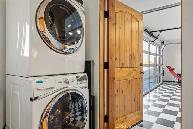 laundry area with stacked washer / dryer