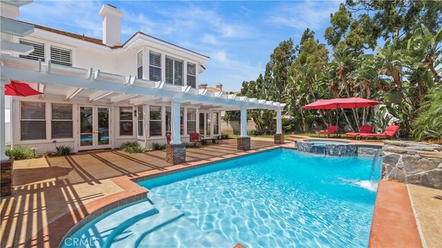 view of pool with an in ground hot tub, a pergola, and a patio