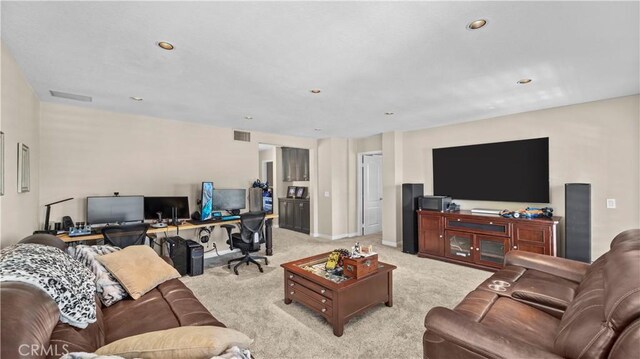 living room featuring light colored carpet