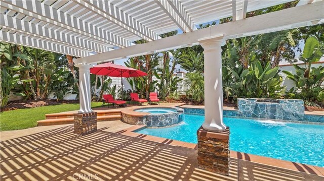 view of swimming pool featuring a pergola, an in ground hot tub, pool water feature, and a patio