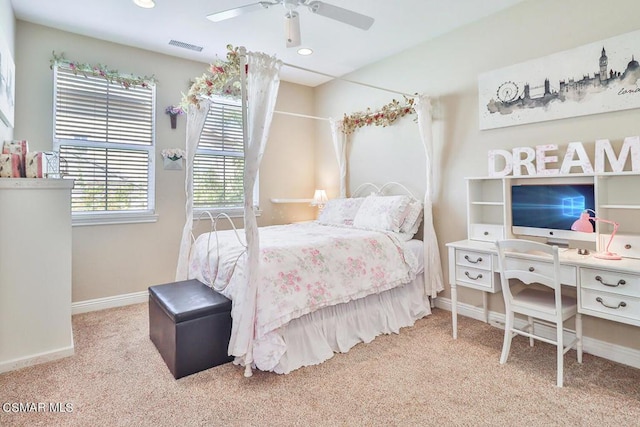 carpeted bedroom featuring ceiling fan