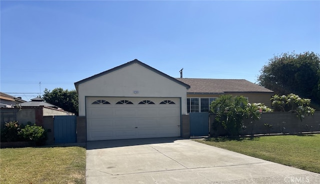 ranch-style home with a front yard and a garage