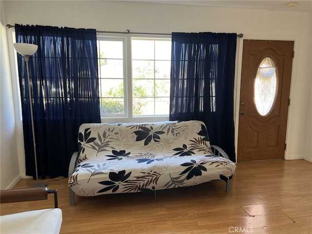 bedroom with hardwood / wood-style flooring