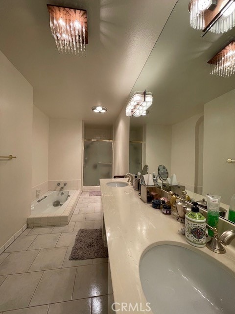 bathroom featuring vanity, plus walk in shower, and tile patterned floors