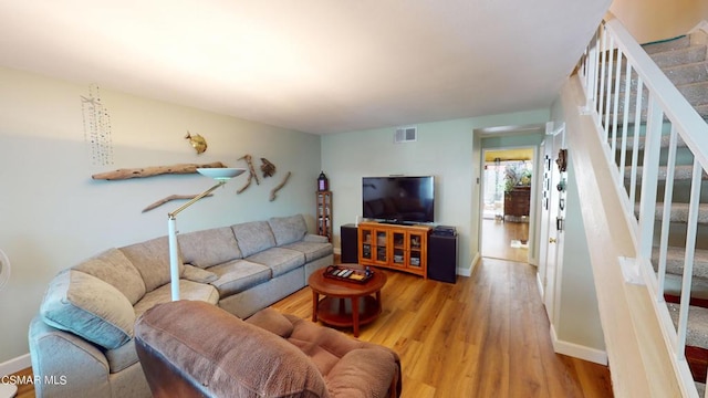 living room with hardwood / wood-style flooring