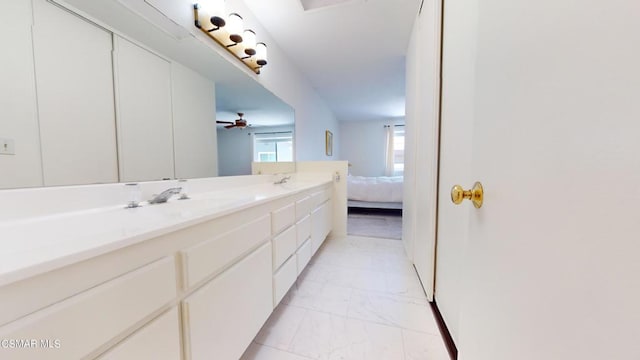 bathroom featuring vanity and ceiling fan