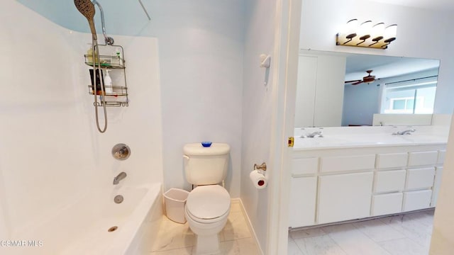 full bathroom with ceiling fan, shower / washtub combination, vanity, and toilet